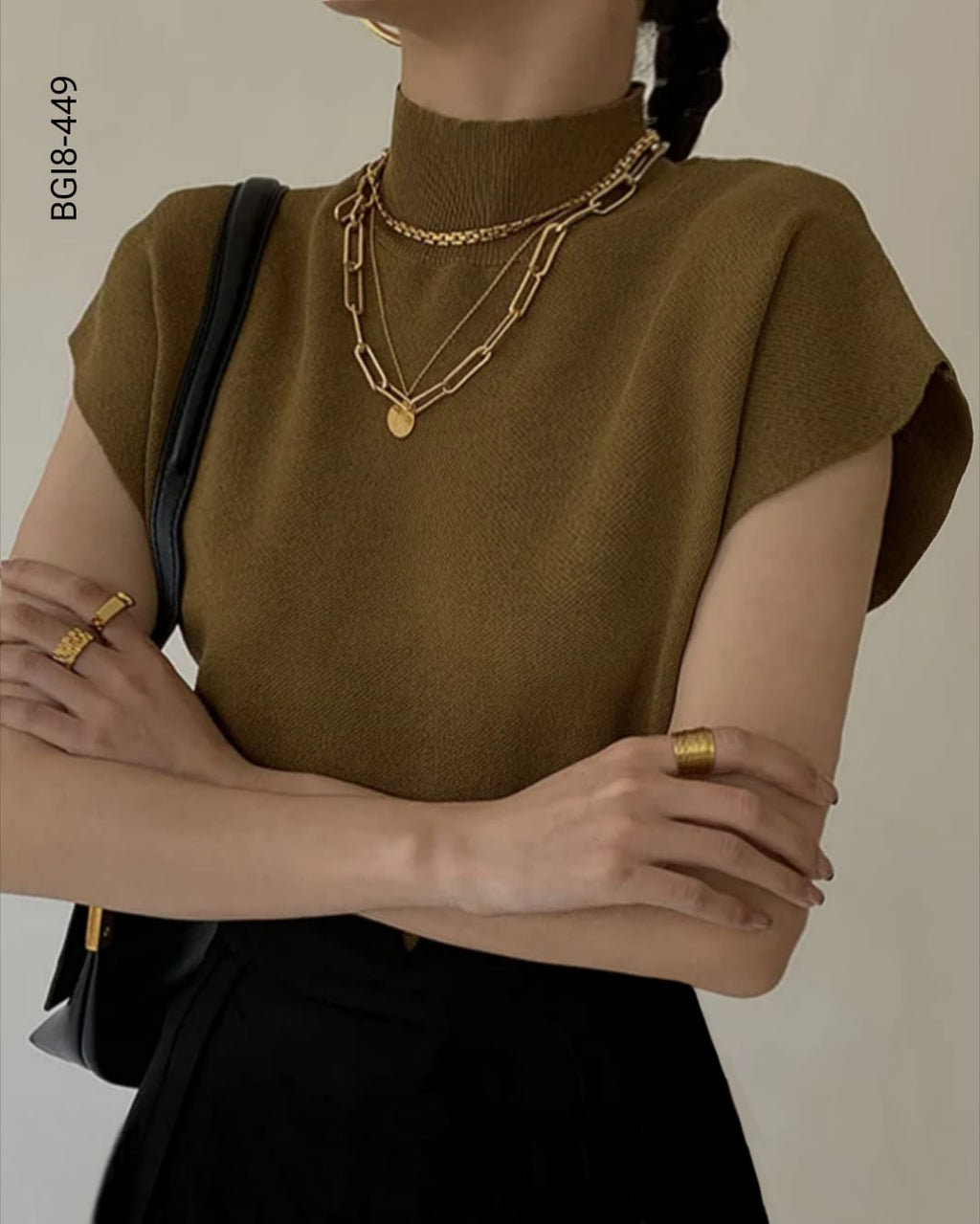 Blusa cuello alto sin mangas H 449